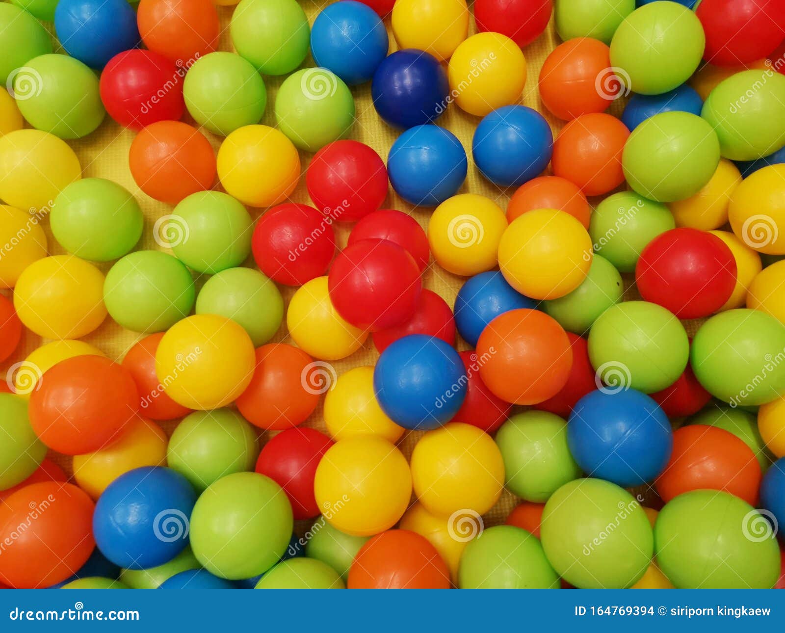 top view colorful plastic balls in a dry pool.ÃÂ 
